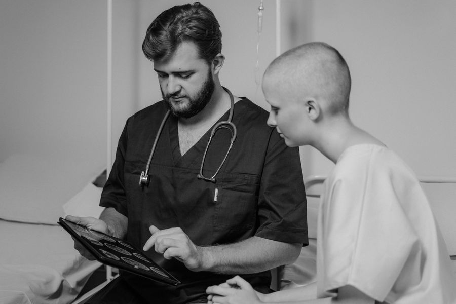 Clinician reviewing patient data on a tablet
