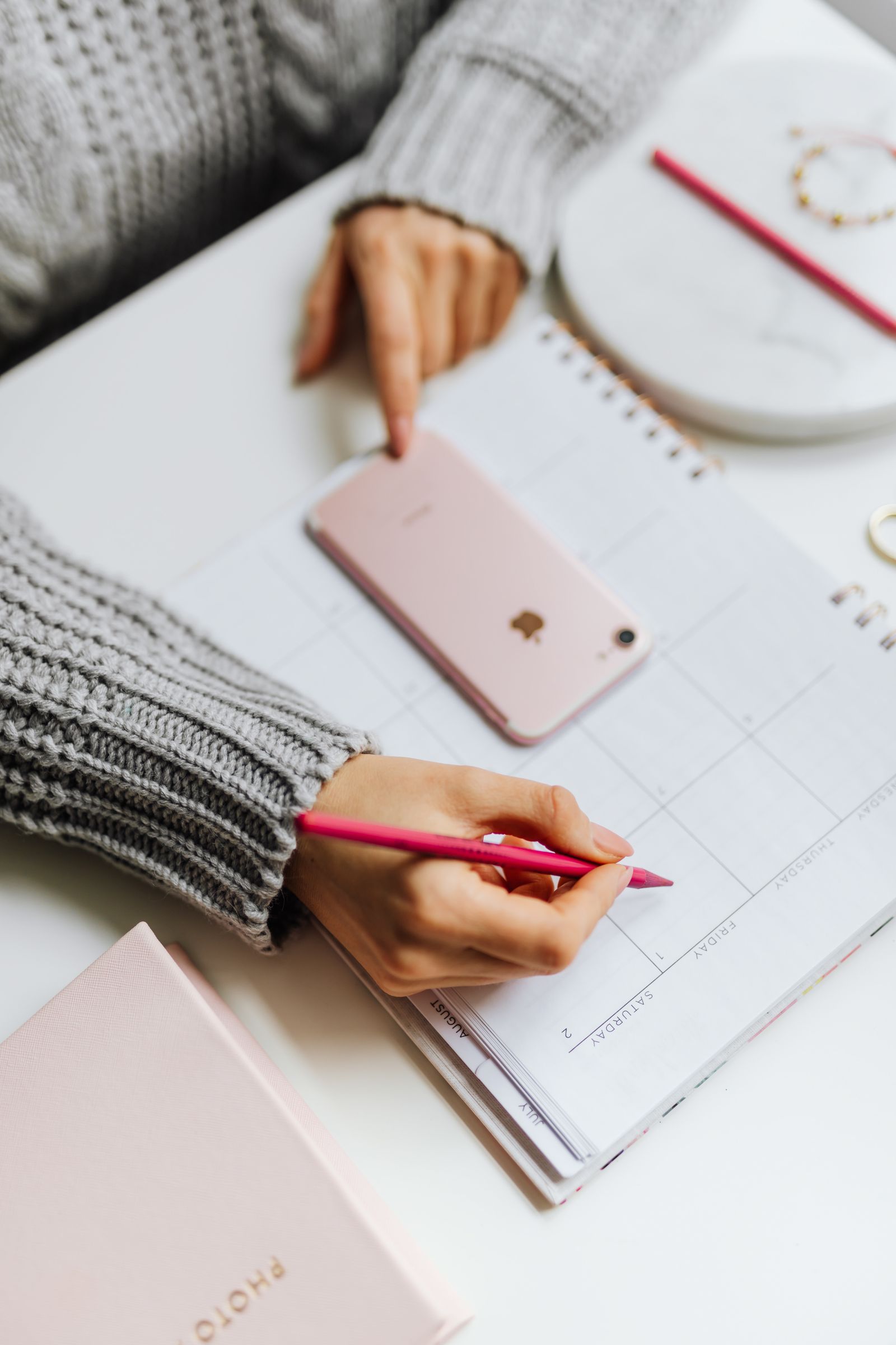 Person building a project schedule at a desk